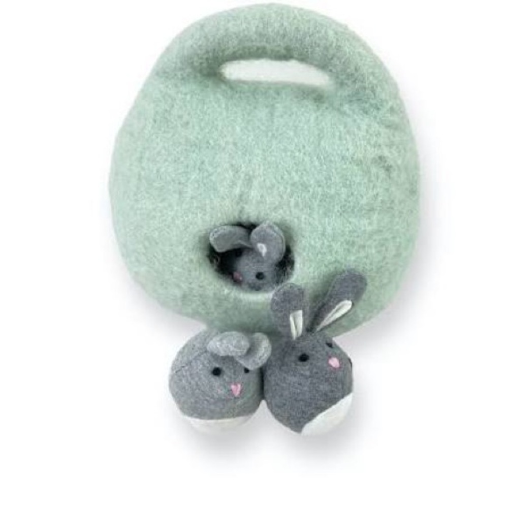 Lovevery bunnies in a felt burrow
